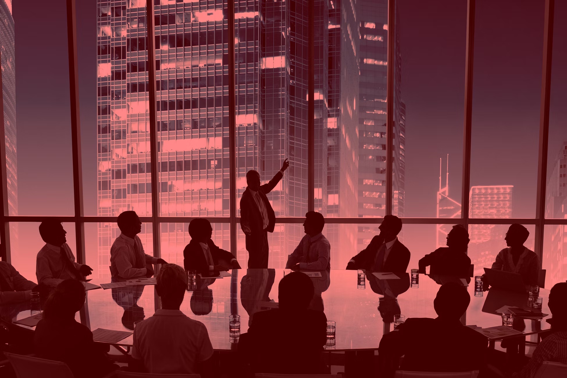 A team discussing strategy in a city meeting room